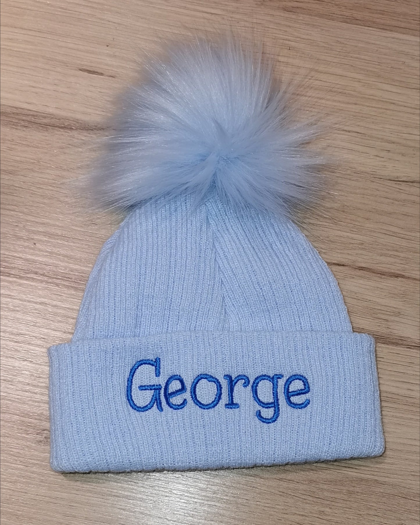 Personalised blue pom pom hat