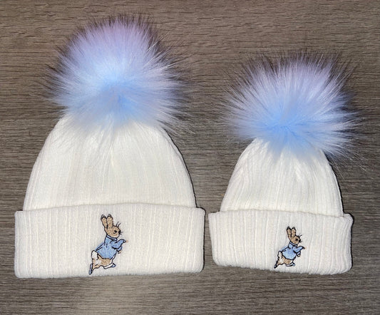 Knitted white & blue peter Rabbit pom pom hats